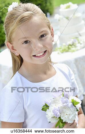 Portrait of flower girl (10-11) View Large Photo Image Picture - Portrait of flower girl (10-11). Fotosearch