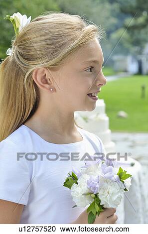 Stock Image - Portrait of flower girl (10-11). Fotosearch