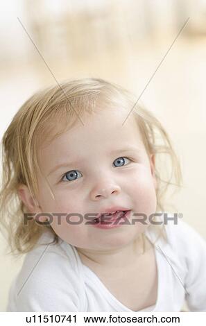 Stock Image - Portrait of girl (2-3) smiling. Fotosearch