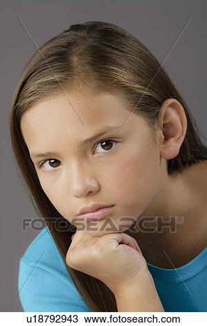 Portrait of girl (8-9), studio shot View Large Photo Image Stock Image - Portrait of girl (8-9), studio shot. Fotosearch