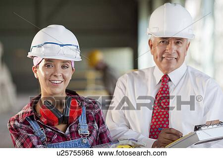 Stock Photo - Portrait of manual worker and manager. Fotosearch