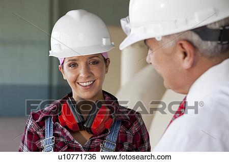 Portrait of manual worker and manager View Large Photo Image Stock Photograph - Portrait of manual worker and manager. Fotosearch