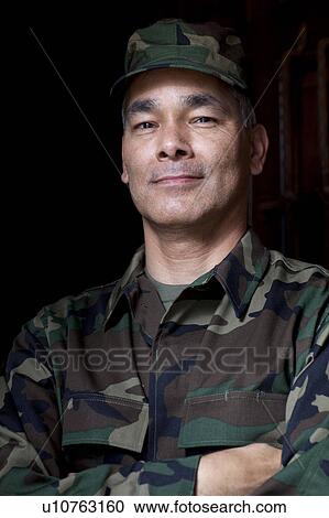 Portrait of mature man wearing military uniform View Large Photo Image Stock Image - Portrait of mature man wearing military uniform. Fotosearch