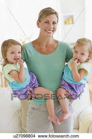 Portrait of mother with daughters (2-3) View Large Photo Image Picture - Portrait of mother with daughters (2-3). Fotosearch