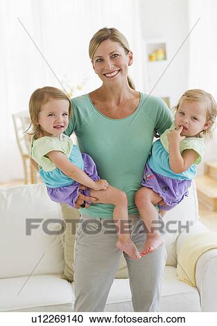 Portrait of mother with daughters (2-3) View Large Photo Image Stock Image - Portrait of mother with daughters (2-3). Fotosearch