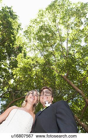 Portrait of newly wed couple View Large Photo Image Stock Photo - Portrait of newly wed couple. Fotosearch