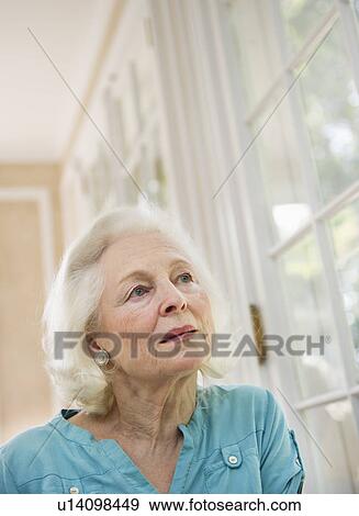 Portrait of pensive senior woman View Large Photo Image Stock Photo - Portrait of pensive senior woman. Fotosearch