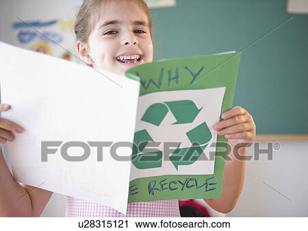 Portrait of schoolgirl ( 6-7) presenting environmental knowledge View Large Photo Image Stock Image - Portrait of schoolgirl ( 6-7) presenting environmental knowledge. Fotosearch