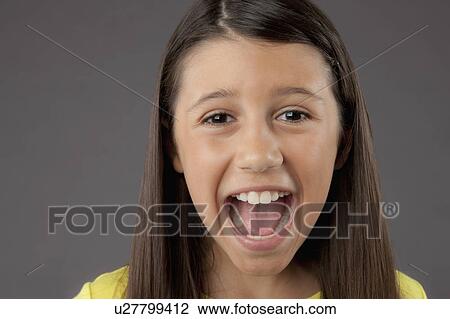 Portrait of screaming girl (8-9), studio shot View Large Photo Image Stock Image - Portrait of screaming girl (8-9), studio shot. Fotosearch