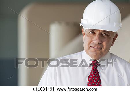 Portrait of senior man wearing tie and hardhat View Large Photo Image Stock Image - Portrait of senior man wearing tie and hardhat. Fotosearch