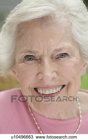 Stock Image - Portrait of senior woman. Fotosearch