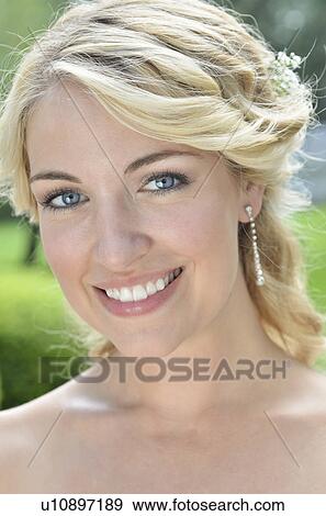 Stock Photo - Portrait of smiling bride. Fotosearch