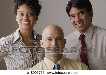 Portrait of smiling business people View Large Photo Image Stock Image - Portrait of smiling business people. Fotosearch