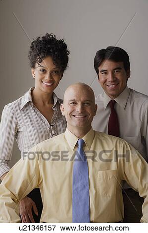 Stock Photo - Portrait of smiling business people. Fotosearch