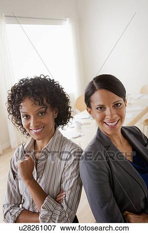 Portrait of smiling businesswoman View Large Photo Image Stock Photo - Portrait of smiling businesswoman. Fotosearch