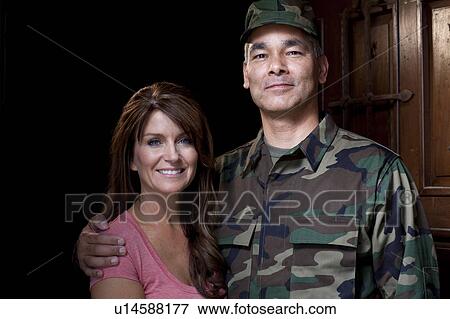 Stock Photo - Portrait of soldier with wife. Fotosearch