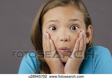Portrait of surprised girl (8-9), studio shot View Large Photo Image Stock Image - Portrait of surprised girl (8-9), studio shot. Fotosearch