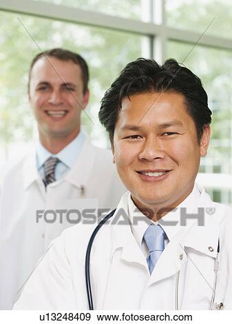 Stock Photo - Portrait of two doctors. Fotosearch
