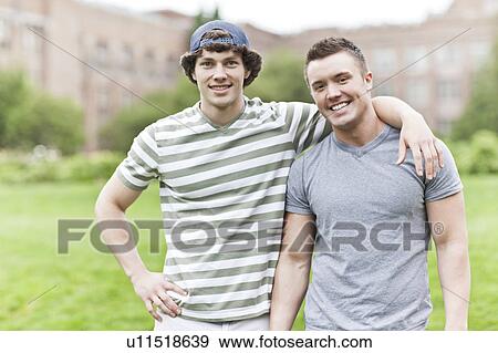 Stock Photo - Portrait of two men on campus. Fotosearch