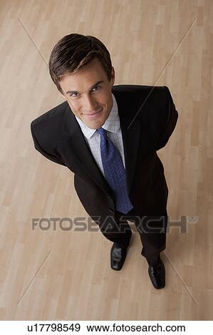 Portrait of young businessman smiling View Large Photo Image Stock Photo - Portrait of young businessman smiling. Fotosearch