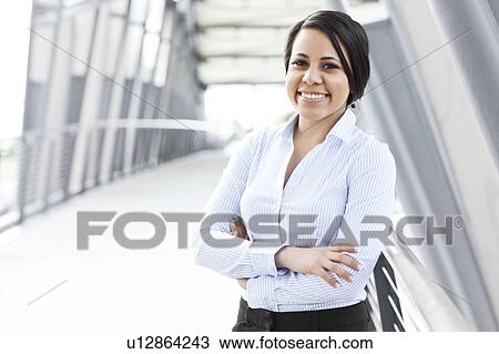 Stock Image - Portrait of young businesswoman. Fotosearch