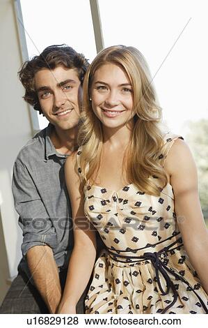 Portrait of young couple at home View Large Photo Image Stock Photo - Portrait of young couple at home. Fotosearch