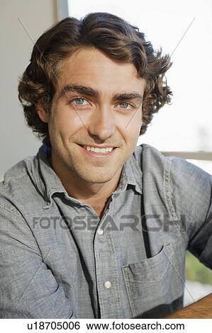 Portrait of young man View Large Photo Image Stock Photograph - Portrait of young man. Fotosearch