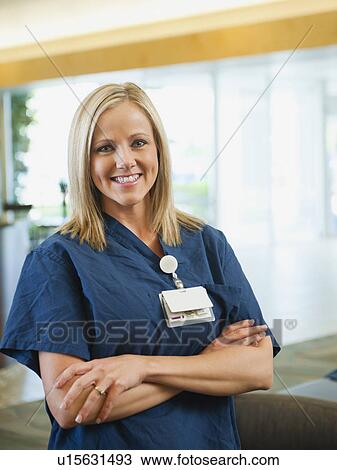 Stock Image - Portrait of young nurse. Fotosearch