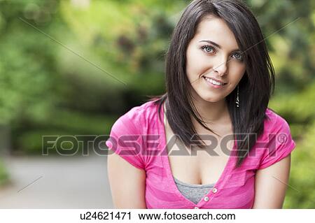 Stock Image - Portrait of young woman. Fotosearch