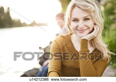 Portrait of young woman View Large Photo Image Stock Photograph - Portrait of young woman. Fotosearch