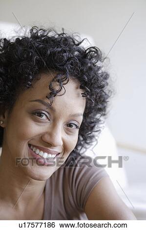 Stock Photograph - Portrait of young woman. Fotosearch