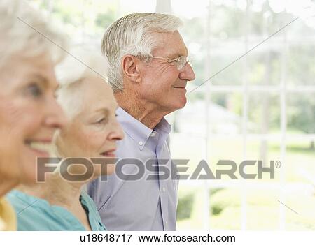 Stock Photo - Profiles of senior women and senior man. Fotosearch