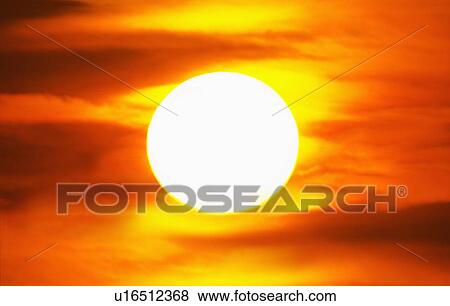 Stock Photo - Rising sun. Fotosearch