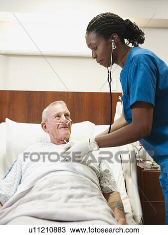 Senior patient and nurse View Large Photo Image Stock Image - Senior patient and nurse. Fotosearch