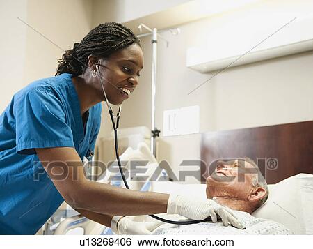 Senior patient and nurse View Large Photo Image Stock Photograph - Senior patient and nurse. Fotosearch