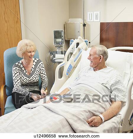 Stock Photo - Senior people in hospital. Fotosearch