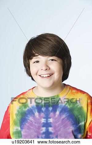 Studio portrait of boy (10-11) in colorful shirt View Large Photo Image Stock Image - Studio portrait of boy (10-11) in colorful shirt. Fotosearch