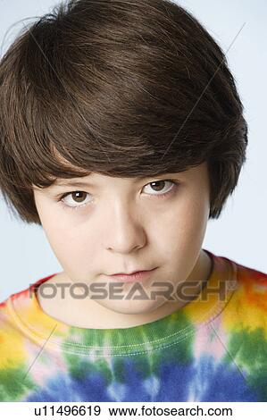 Studio portrait of boy (10-11) View Large Photo Image Stock Photo - Studio portrait of boy (10-11). Fotosearch