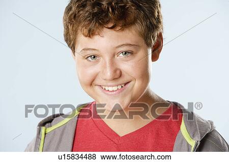 Studio portrait of boy (12-13) View Large Photo Image Stock Photo - Studio portrait of boy (12-13). Fotosearch
