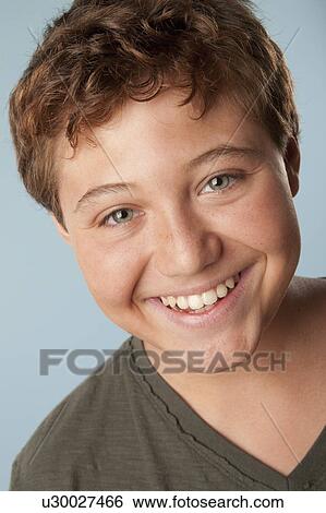 Studio portrait of boy (12-13) View Large Photo Image Stock Photograph - Studio portrait of boy (12-13). Fotosearch