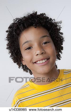 Studio portrait of boy (8-9) View Large Photo Image Stock Photography - Studio portrait of boy (8-9). Fotosearch