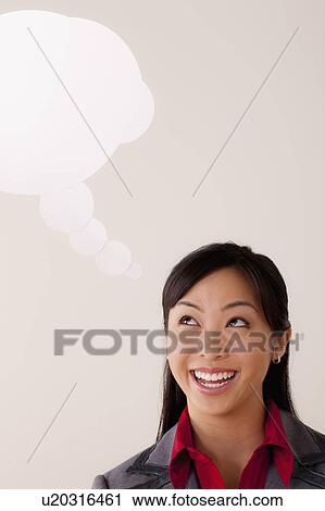 Studio portrait of businesswoman with thought bubble View Large Photo Image Stock Image - Studio portrait of businesswoman with thought bubble. Fotosearch