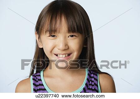 Studio portrait of girl (10-11) View Large Photo Image Stock Image - Studio portrait of girl (10-11). Fotosearch