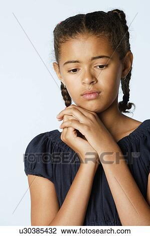 Studio portrait of girl (10-11) View Large Photo Image Stock Image - Studio portrait of girl (10-11). Fotosearch