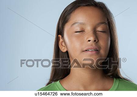Studio portrait of girl (10-11) with closed eyes View Large Photo Image Stock Photograph - Studio portrait of girl (10-11) with closed eyes. Fotosearch