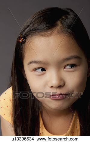 Studio portrait of girl (8-9) View Large Photo Image Picture - Studio portrait of girl (8-9). Fotosearch