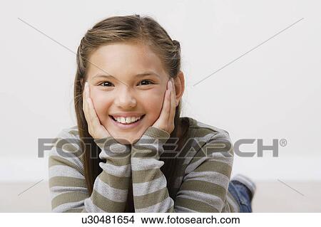 Studio portrait of girl (8-9) View Large Photo Image Picture - Studio portrait of girl (8-9). Fotosearch