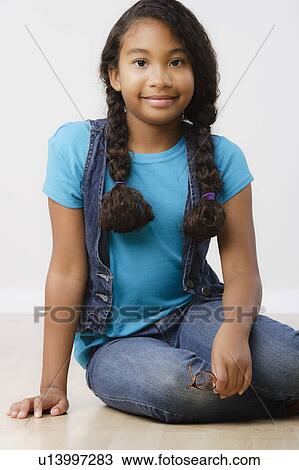 Studio portrait of girl (8-9) View Large Photo Image Stock Image - Studio portrait of girl (8-9). Fotosearch
