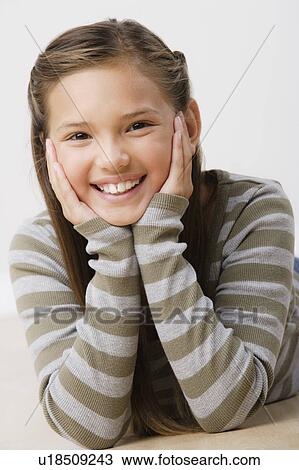 Studio portrait of girl (8-9) View Large Photo Image Stock Image - Studio portrait of girl (8-9). Fotosearch