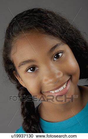 Studio portrait of girl (8-9) View Large Photo Image Stock Image - Studio portrait of girl (8-9). Fotosearch